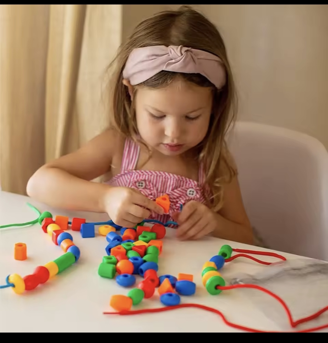 Jeux de perles et de laçage Montessori