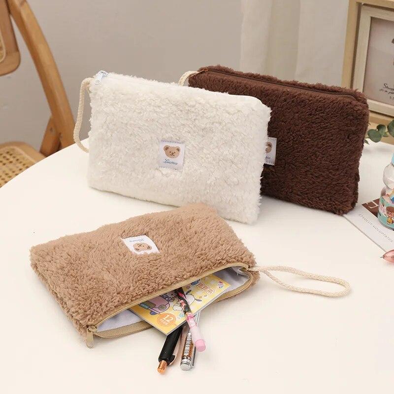 Superbe pochette pour transporter le nécessaire à bébé pour les petites sorties