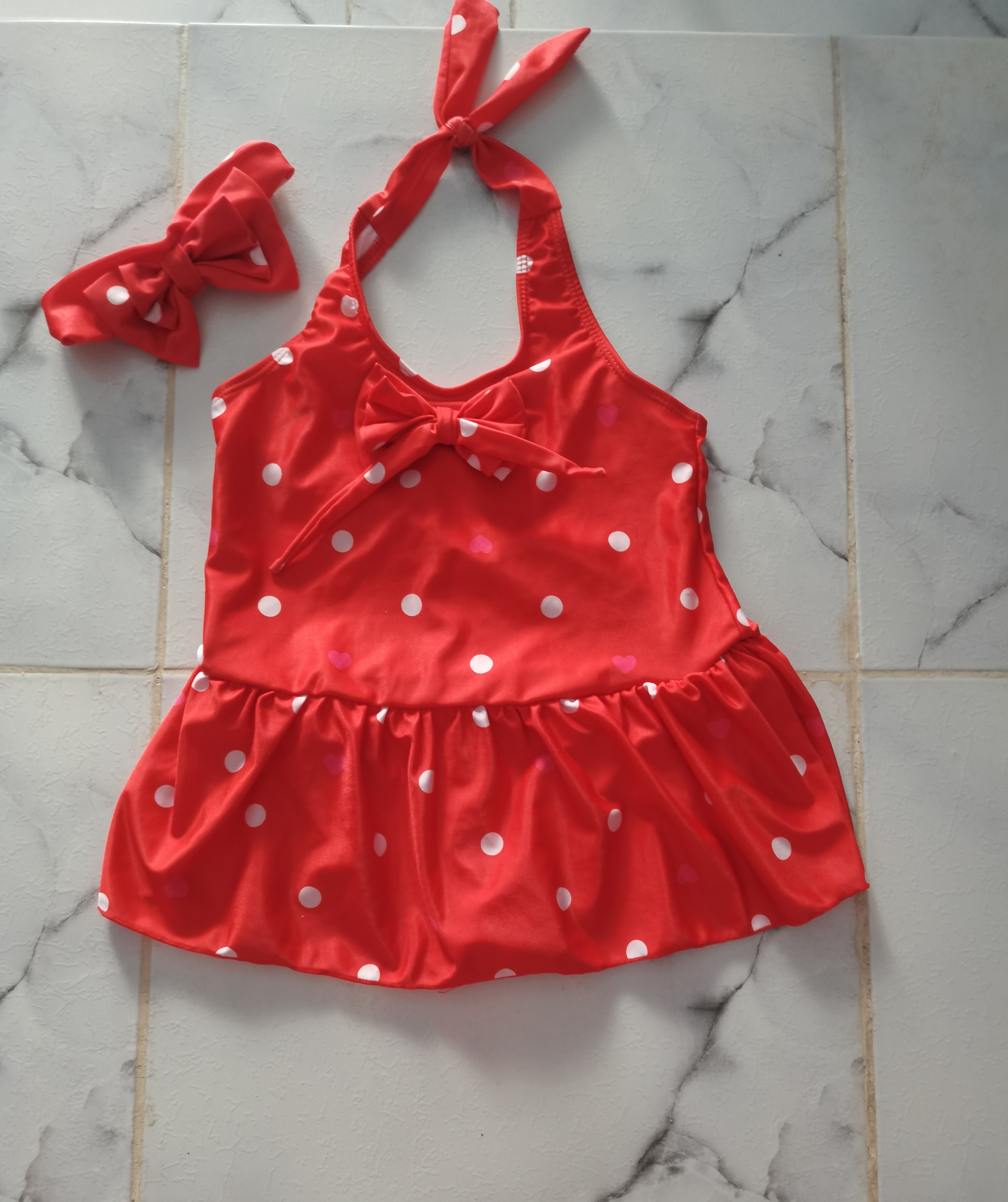 État neuf ... porté une seule fois maillot+ bandeau assorti