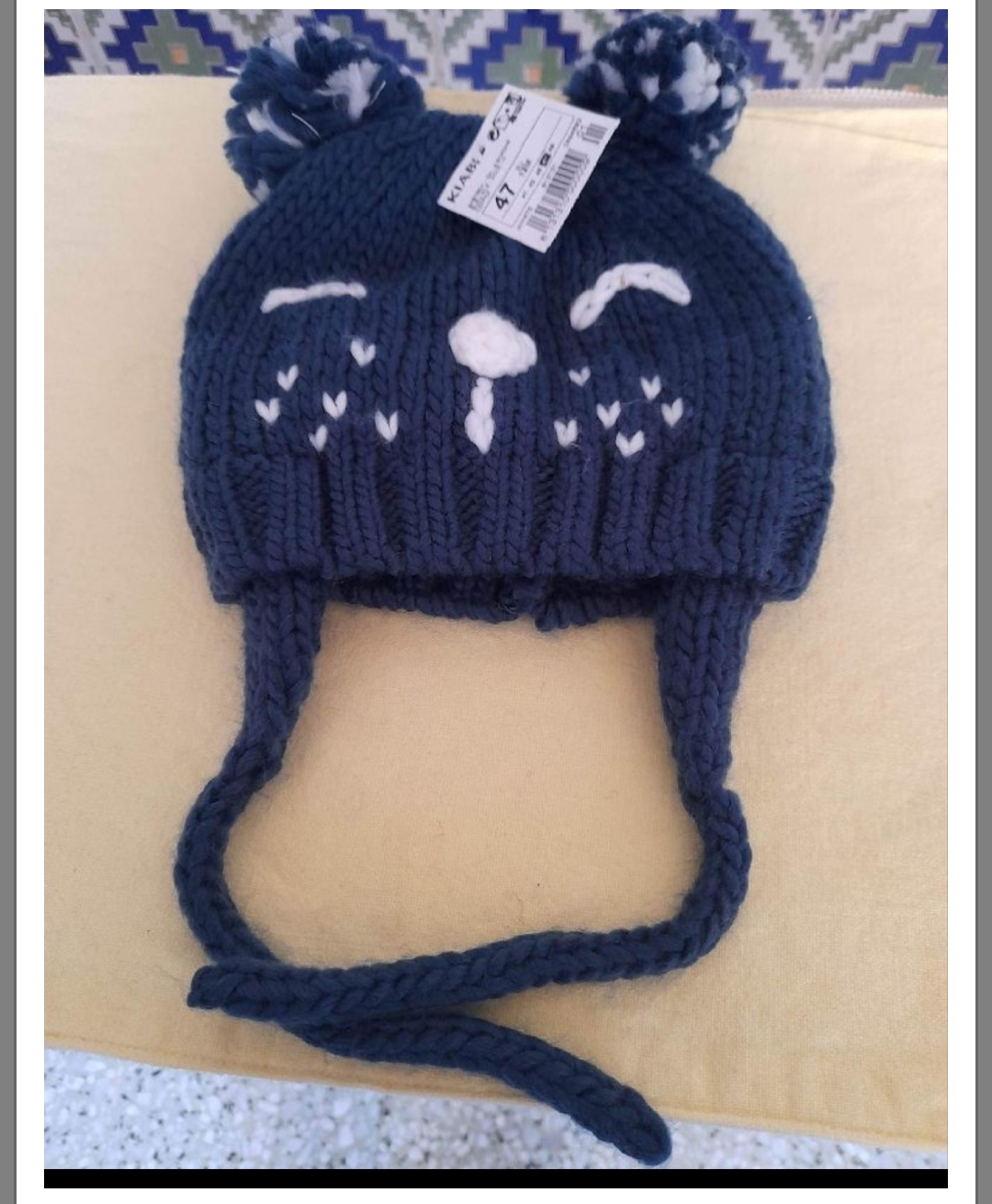 Superbe bonnet 9/  12 mois marque Kiabi