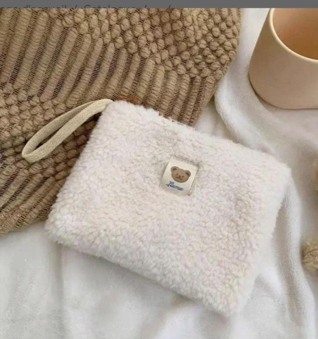 Superbe pochette pour transporter le nécessaire à bébé pour les petites sorties