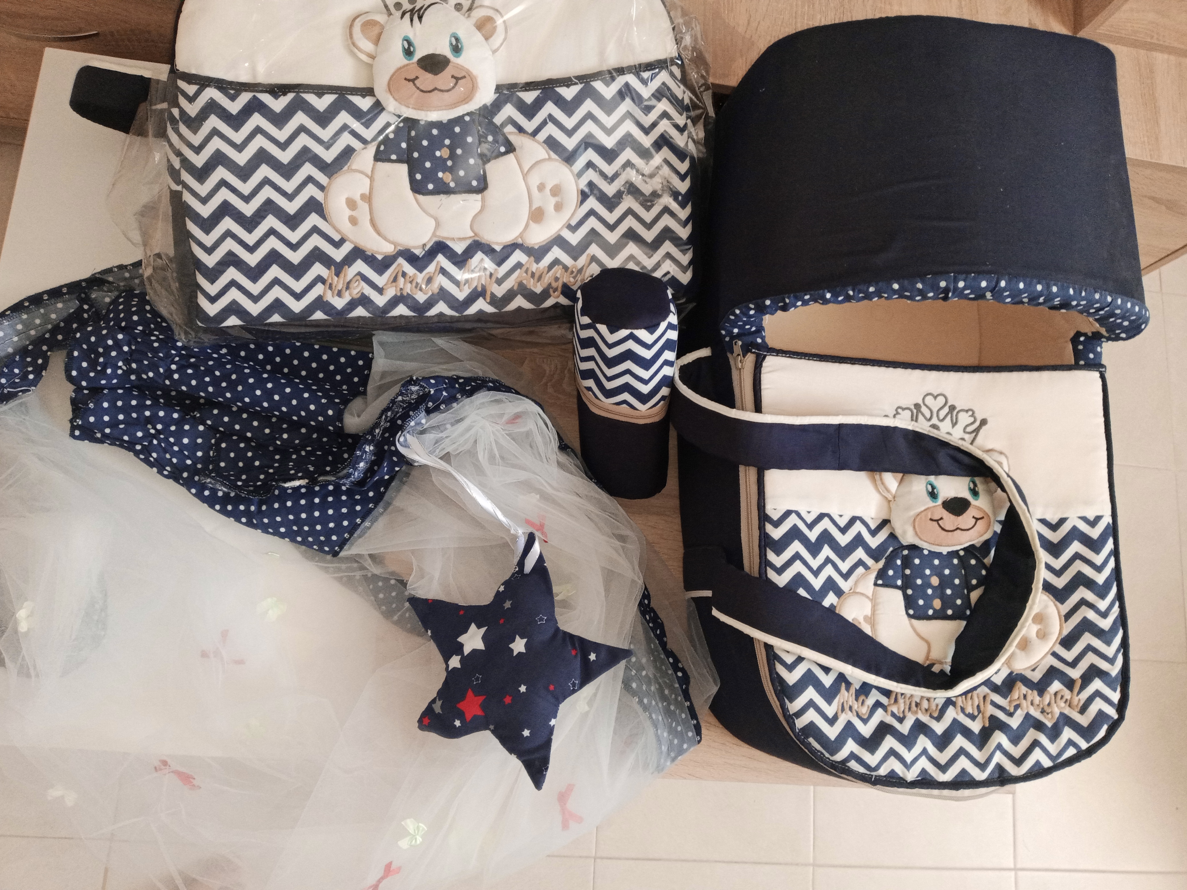 Landeau, sac et moustiquaire